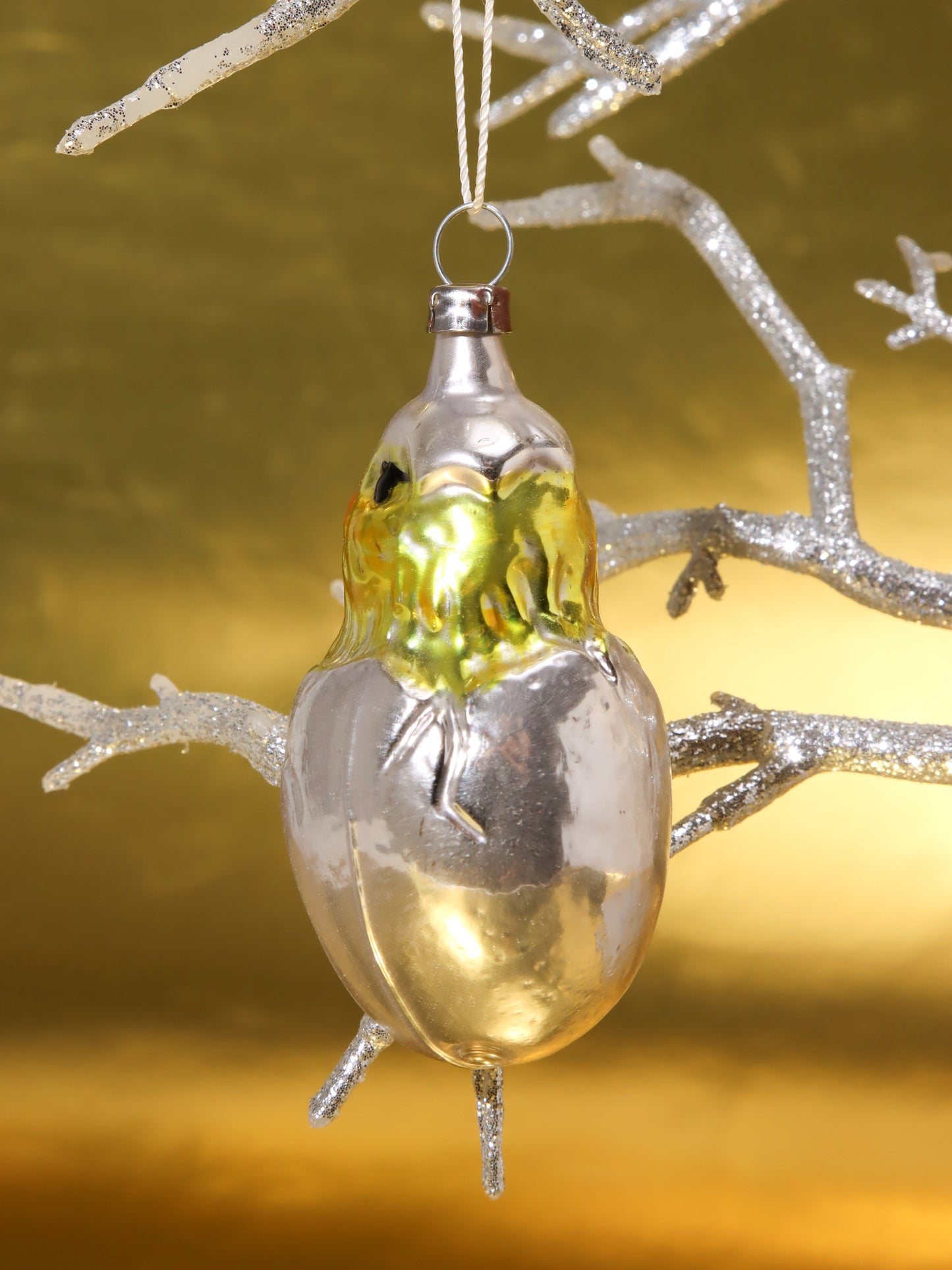 オーナメント POUSSIN DANS UN